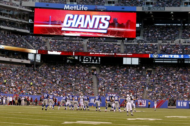The New York Giants' offense prepares to line up against the New York Jets' defense during the first quarter of an NFL preseason football game, Monday, Aug. 29, 2011, in East Rutherford, N.J. (AP Photo/Julio Cortez)