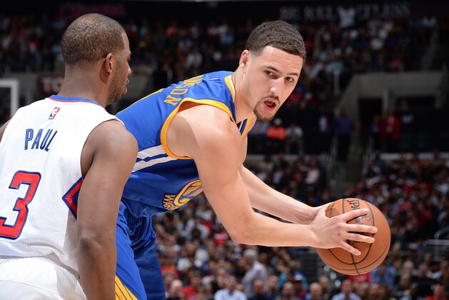 LOS ANGELES, CA - MARCH 31:  Klay Thompson #11 of the Golden State Warriors handles the ball against the Los Angeles Clippers on March 31, 2015 at STAPLES Center in Los Angeles, California. NOTE TO USER: User expressly acknowledges and agrees that, by downloading and/or using this Photograph, user is consenting to the terms and conditions of the Getty Images License Agreement. Mandatory Copyright Notice: Copyright 2015 NBAE (Photo by Andrew D. Bernstein/NBAE via Getty Images)