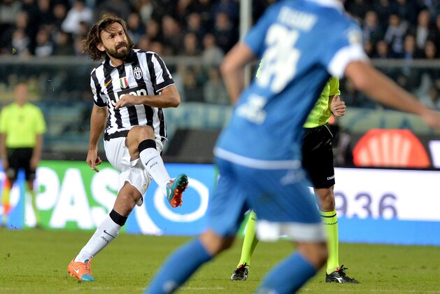 Juventus Andrea Pirlo scores during a Serie A soccer match between Empoli and Juventus at the Carlo Castellani stadium, in Empoli, Italy, Saturday, Nov. 1, 2014. (AP Photo/Massimo Pinca)