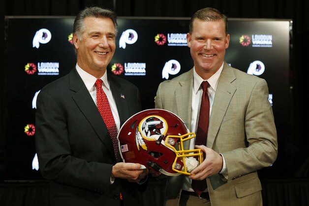 Jan 9, 2015; Ashburn, VA, USA; Washington Redskins president Bruce Allen (left) and Washington Redskins new general manager Scot McCloughan pose for a picture at an introductory press conference for McCloughan at Redskins Park. Mandatory Credit: Geoff Burke-USA TODAY Sports