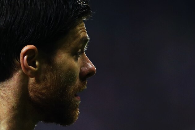 Bayern's Xabi Alonso of Spain attends the German Soccer Cup round of sixteen match between FC Bayern Munich and Eintracht Braunschweig in Munich, southern Germany, Wednesday, March 4, 2015. (AP Photo/Matthias Schrader)