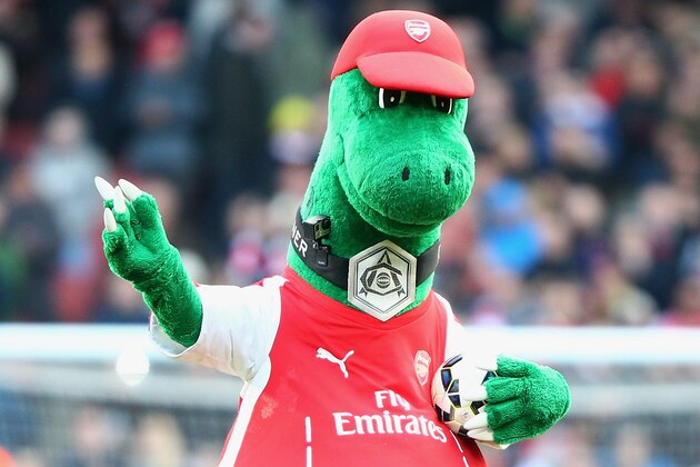 LONDON, ENGLAND - MARCH 14: Arsenal mascot Gunnersaurus appears on the pitch prior to the Barclays Premier League match between Arsenal and West Ham United at Emirates Stadium on March 14, 2015 in London, England.  (Photo by Ian Walton/Getty Images)
