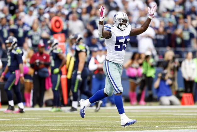 Oct 12, 2014; Seattle, WA, USA; Dallas Cowboys middle linebacker Rolando McClain (55) celebrates after a failed fourth down play by the Seattle Seahawks during the fourth quarter of a 26-20 Dallas victory at CenturyLink Field. Mandatory Credit: Joe Nicholson-USA TODAY Sports