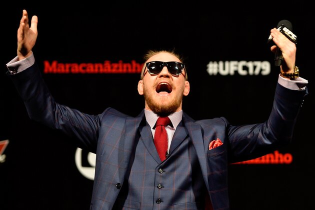 RIO DE JANEIRO, BRAZIL - OCTOBER 24:  Conor McGregor of Ireland interacts with fans during a Q&A session before the UFC 179 weigh-in  at Maracanazinho on October 24, 2014 in Rio de Janeiro, Brazil.  (Photo by Buda Mendes/Getty Images)