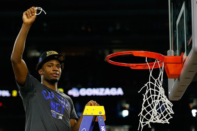 HOUSTON, TX - MARCH 29: Justise Winslow #12 of the Duke Blue Devils cuts down the net after defeating the Gonzaga Bulldogs 66-52 in the South Regional Final of the 2015 NCAA Men's Basketball Tournament at NRG Stadium on March 29, 2015 in Houston, Texas.  (Photo by Tom Pennington/Getty Images)