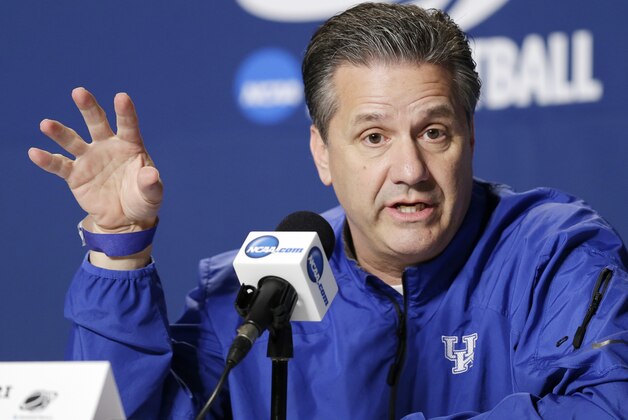 Kentucky head coach John Calipari answers questions during his news conference at the NCAA men's basketball tournament Friday, March 27, 2015, in Cleveland. Kentucky plays Notre Dame in the regional final Saturday, hoping to extend their unbeaten streak and reach the Final Four. (AP Photo/Mark Duncan)