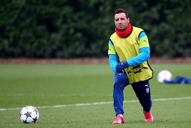 ST ALBANS, ENGLAND - MARCH 16: Arsenal's Santi Cazorla warms up during the Arsenal Training Session ahead of their Champions League match against AS Monaco on March 16, 2015 in St Albans, England. (Photo by Charlie Crowhurst/Getty Images)