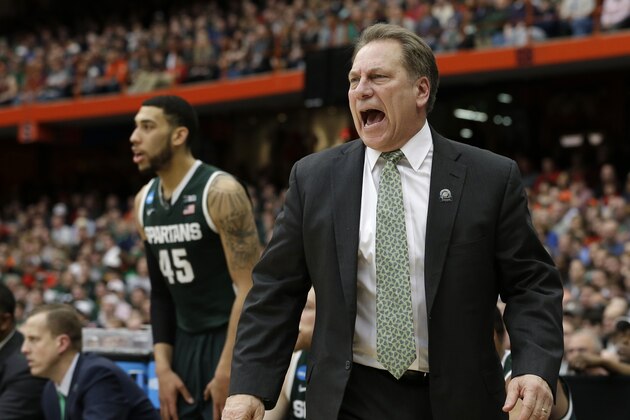 Michigan State head coach Tom Izzo yells during the first half of a regional final against Louisville in the NCAA men's college basketball tournament Sunday, March 29, 2015, in Syracuse, N.Y.  (AP Photo/Seth Wenig)