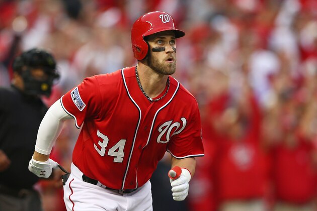 WASHINGTON, DC - OCTOBER 03:  Bryce Harper #34 of the Washington Nationals rounds the bases after hitting a home run in the seventh inning against the San Francisco Giants during Game One of the National League Division Series at Nationals Park on October 3, 2014 in Washington, DC.  (Photo by Elsa/Getty Images)