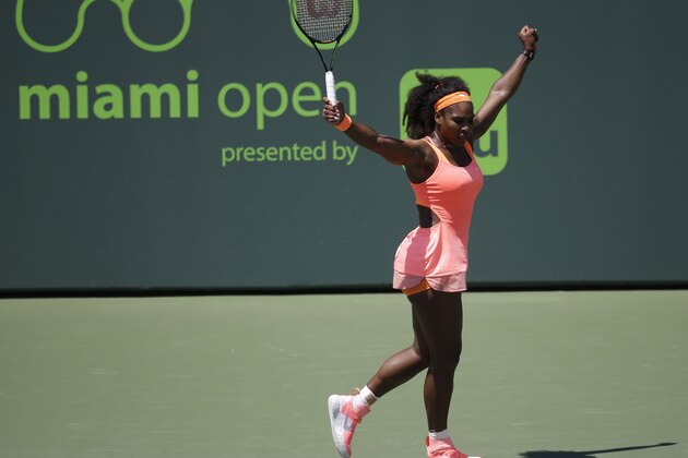 Serena Williams reacts after winning a point against Sabine Lisicki during their quarterfinal match at the Miami Open tennis tournament, Wednesday, April 1, 2015, in Key Biscayne, Fla. (AP Photo/Lynne Sladky)