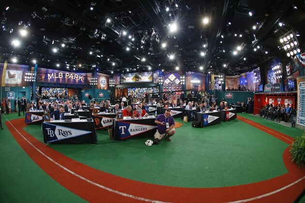 SECAUCUS, NJ - JUNE 5: Representatives from all 30 Major League Baseball teams fill Studio 42 during the MLB First-Year Player Draft at the MLB Network Studio on June 5, 2014 in Secacucus, New Jersey. (Photo by Rich Schultz/Getty Images)