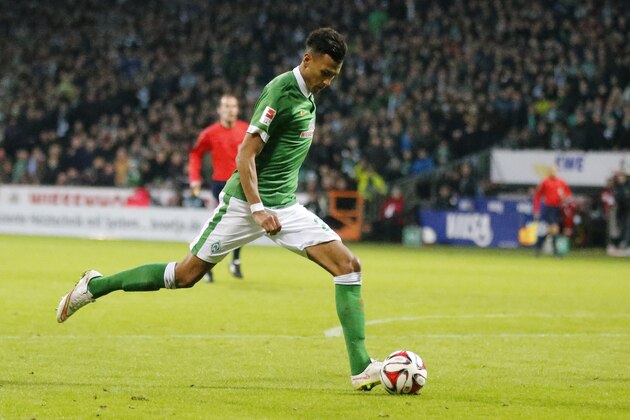 Bremen's Davie Selke challenge for the ball during the German first division Bundesliga soccer match between Werder Bremen and VfL Wolfsburg in Bremen, Germany, Sunday, March 1, 2015. (AP Photo/Frank Augstein)