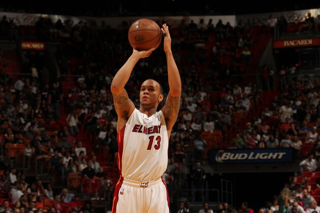 MIAMI, FL - MARCH 7:  Shabazz Napier #13 of the Miami Heat prepares to shoot a free throw against the Sacramento Kings on March 7, 2015 at American Airlines Arena in Miami, Florida.  NOTE TO USER: User expressly acknowledges and agrees that, by downloading and or using this Photograph, user is consenting to the terms and conditions of the Getty Images License Agreement. Mandatory Copyright Notice: Copyright 2015 NBAE (Photo by Issac Baldizon/NBAE via Getty Images)
