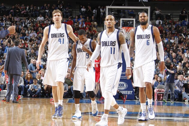 DALLAS, TX - FEBRUARY 20: Dirk Nowitzki #41, Rajon Rondo #9, Monta Ellis #11, and Tyson Chandler #6 of the Dallas Mavericks stand on the court during a game against the Houston Rockets on February 20, 2015 at the American Airlines Center in Dallas, Texas. NOTE TO USER: User expressly acknowledges and agrees that, by downloading and or using this photograph, User is consenting to the terms and conditions of the Getty Images License Agreement. Mandatory Copyright Notice: Copyright 2015 NBAE (Photo by Danny Bollinger/NBAE via Getty Images)