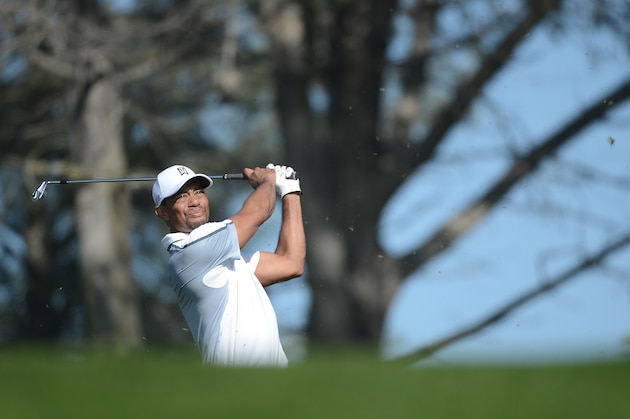LA JOLLA, CA - FEBRUARY 05:  Tiger Woods plays his tee shot on the 17th hole of the north course during the first round of the Farmers Insurance Open at Torrey Pines Golf Course on February 5, 2015 in La Jolla, California.  (Photo by Donald Miralle/Getty Images)