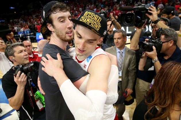 LOS ANGELES, CA - MARCH 28:  Frank Kaminsky #44 and Sam Dekker #15 of the Wisconsin Badgers celebrate the Badgers 85-78 win against the Arizona Wildcats during the West Regional Final of the 2015 NCAA Men's Basketball Tournament at Staples Center on March 28, 2015 in Los Angeles, California.  (Photo by Stephen Dunn/Getty Images)