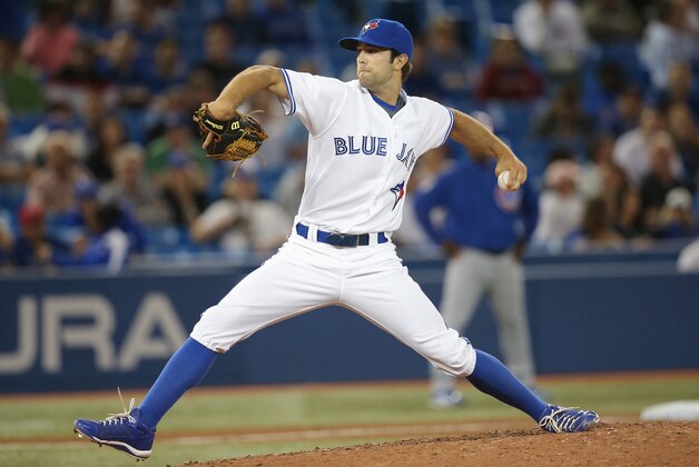 TORONTO, CANADA - SEPTEMBER 9: Daniel Norris #32 of the Toronto Blue Jays delivers a pitch in the ninth inning during MLB game action against the Chicago Cubs on September 9, 2014 at Rogers Centre in Toronto, Ontario, Canada. (Photo by Tom Szczerbowski/Getty Images)