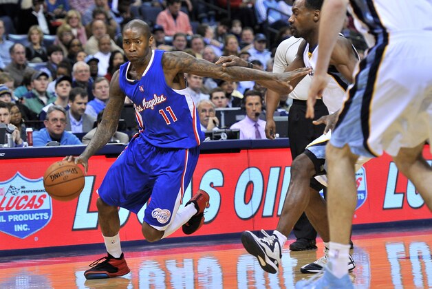 Los Angeles Clippers guard Jamal Crawford (11) drives against Memphis Grizzlies forward Tony Allen in the first half of an NBA basketball game Friday, Feb. 27, 2015, in Memphis, Tenn. (AP Photo/Brandon Dill)