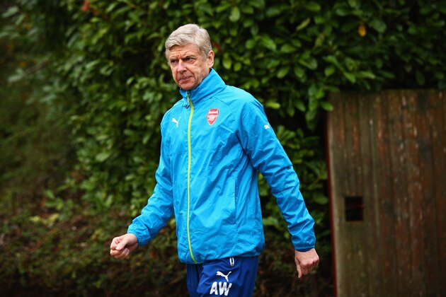 ST ALBANS, ENGLAND - NOVEMBER 25:  Arsene Wenger manager of Arsenal looks on during an Arsenal training session, ahead of the UEFA Champions League Group D match against Borussia Dortmund, at London Colney on November 25, 2014 in St Albans, England.  (Photo by Ian Walton/Getty Images)