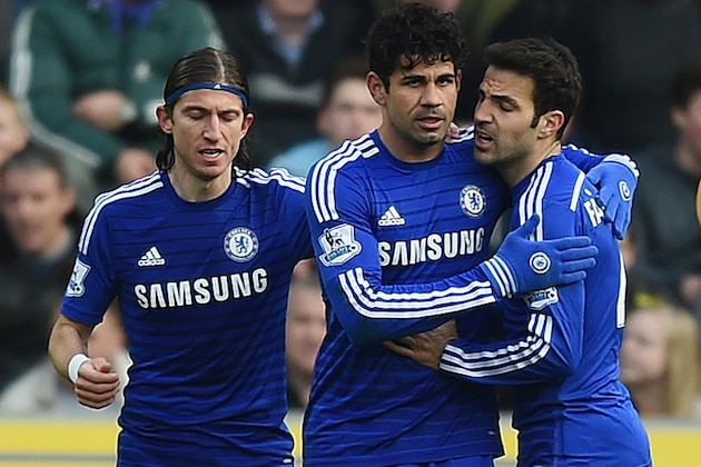 HULL, ENGLAND - MARCH 22: Diego Costa of Chelsea (2L) celebrates with Filipe Luis (L) and Cesc Fabregas (2R) as he scores their second goal during the Barclays Premier League match between Hull City and Chelsea at KC Stadium on March 22, 2015 in Hull, England. (Photo by Michael Regan/Getty Images) HULL, ENGLAND - MARCH 22: Diego Costa of Chelsea (2L) celebrates with Filipe Luis (L) and Cesc Fabregas (2R) as he scores their second goal during the Barclays Premier League match between Hull City and Chelsea at KC Stadium on March 22, 2015 in Hull, England. (Photo by Michael Regan/Getty Images)