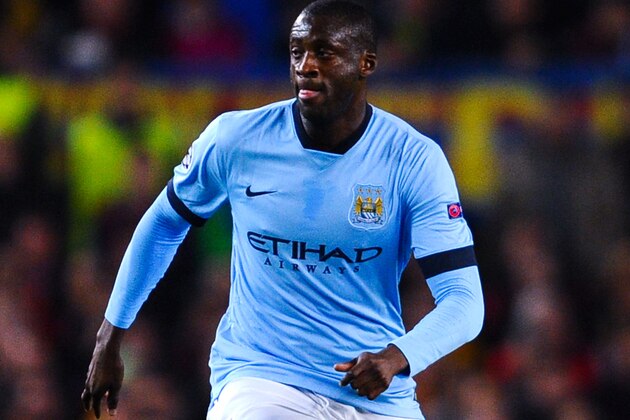 BARCELONA, SPAIN - MARCH 18:  Yaya Toure of Manchester City FC runs with the ball during the UEFA Champions League round of 16 second leg match between FC Barcelona and Manchester City at the Camp Nou stadium on March 18, 2015 in Barcelona, Spain.  (Photo by David Ramos/Getty Images)