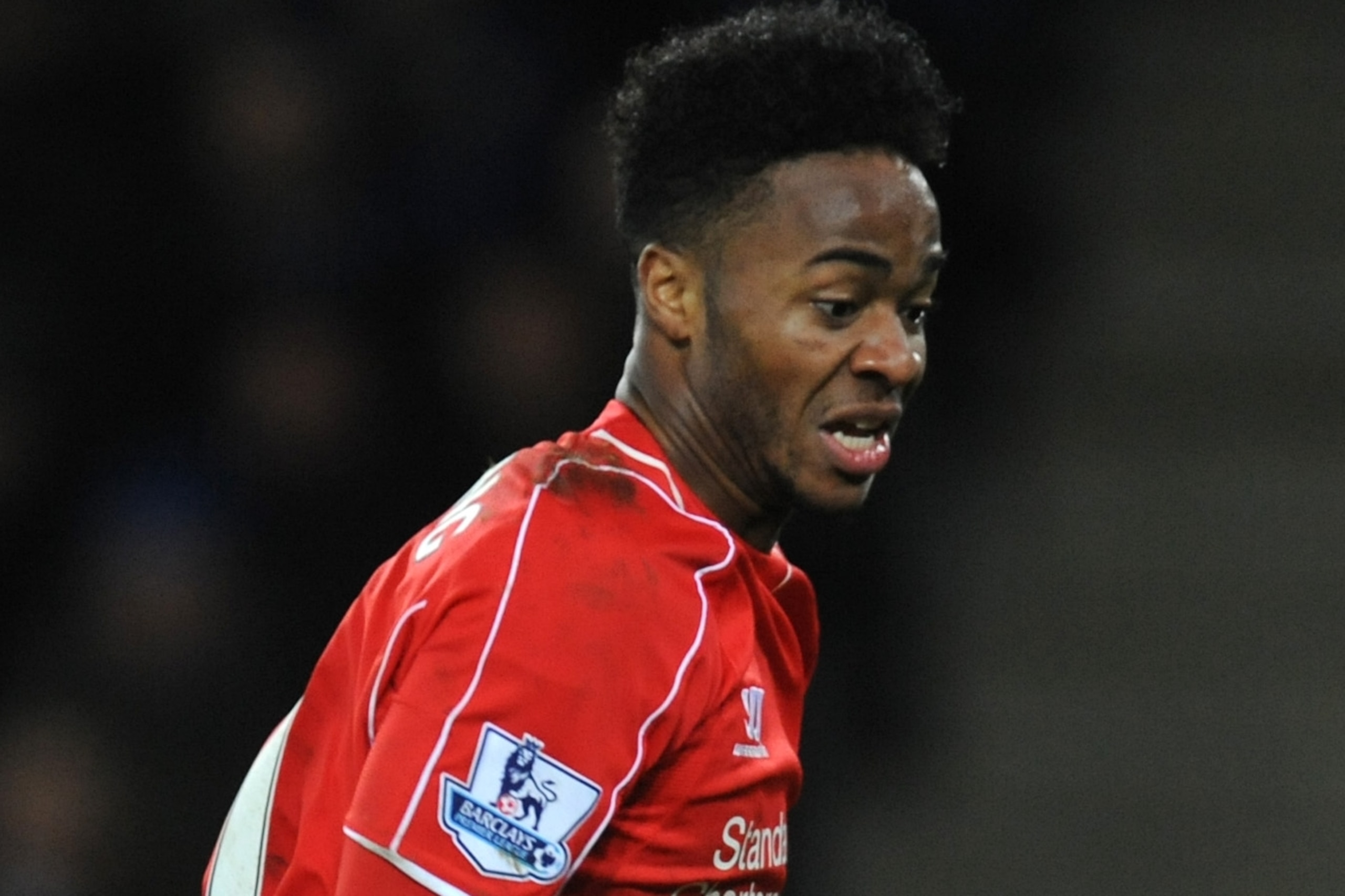 Liverpool's Raheem Sterling during the English Premier League soccer match between Leicester City and Liverpool at King Power Stadium, in Leicester, England, Tuesday, Dec. 2, 2014.  (AP Photo/Rui Vieira)