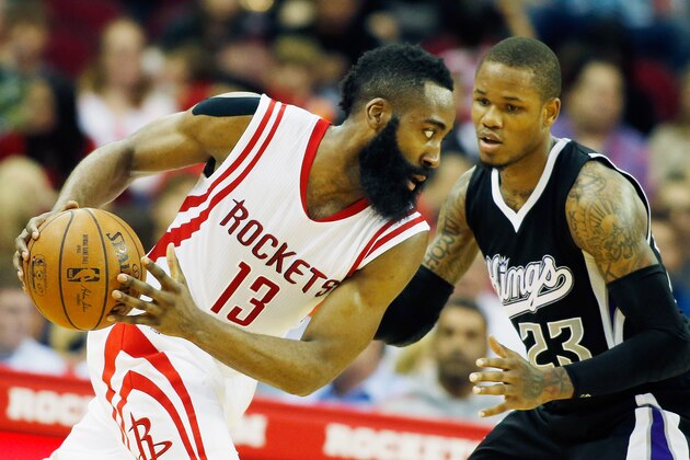 HOUSTON, TX - APRIL 01:   James Harden #13 of the Houston Rockets looks to drive with the basketball against Ben McLemore #23 of the Sacramento Kings during their game at the Toyota Center on April 1, 2015 in Houston, Texas. NOTE TO USER: User expressly acknowledges and agrees that, by downloading and/or using this photograph, user is consenting to the terms and conditions of the Getty Images License Agreement. (Photo by Scott Halleran/Getty Images)