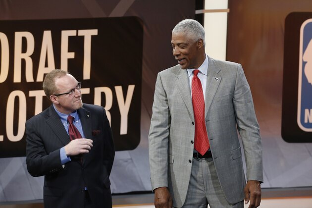 From left, Cleveland Cavaliers general manager David Griffin, left, chats with Philadelphia 76er's strategic adviser Julius Erving Milwaukee Bucks representative Mallory Edens, daughter of  Milwaukee Bucks co-owner Wes Edens, stands by on stage during the NBA draft lottery in New York, Tuesday, May 20, 2014.  (AP Photo/Kathy Willens)