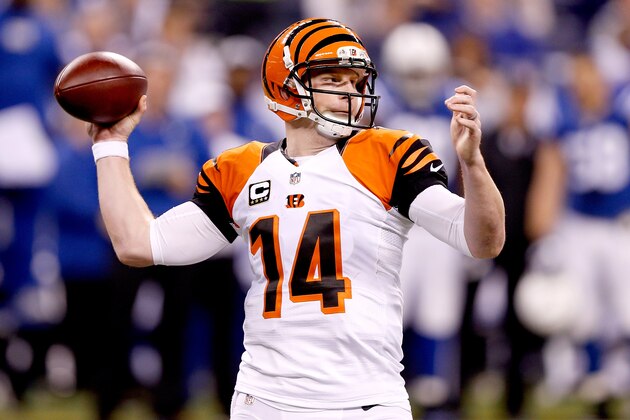 INDIANAPOLIS, IN - JANUARY 04: Quarterback Andy Dalton #14 of the Cincinnati Bengals throws against the Indianapolis Colts in the first half during their AFC Wild Card game at Lucas Oil Stadium on January 4, 2015 in Indianapolis, Indiana.  (Photo by Joe Robbins/Getty Images)