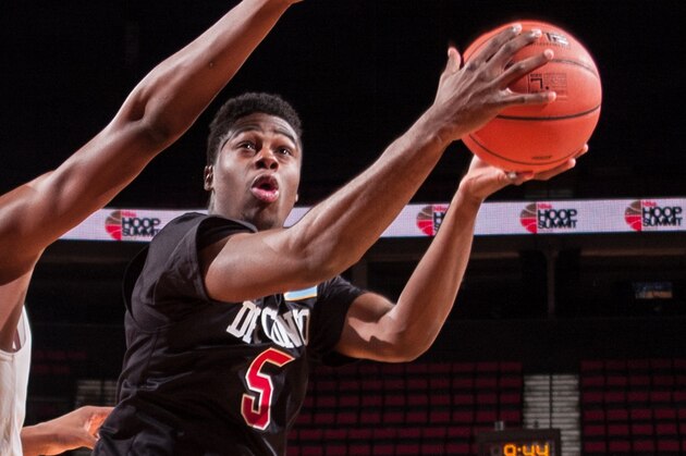 PORTLAND, OR - APRIL 12:  Emmanuel Mudiay #5 of the World Team drives to the basket during the game against Team USA on April 12, 2014 at the Moda Center Arena in Portland, Oregon. NOTE TO USER: User expressly acknowledges and agrees that, by downloading and or using this photograph, user is consenting to the terms and conditions of the Getty Images License Agreement. Mandatory Copyright Notice: Copyright 2014 NBAE (Photo by Sam Forencich/NBAE via Getty Images)