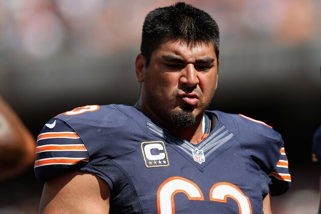 CHICAGO, IL - SEPTEMBER 09: Roberto Garza #63 of the Chicago Bears waits in the huddle against the Indianapolis Colts during their 2012 NFL season opener at Soldier Field on September 9, 2012 in Chicago, Illinois. The Bears defeated the Colts 41-21. (Photo by Jonathan Daniel/Getty Images)