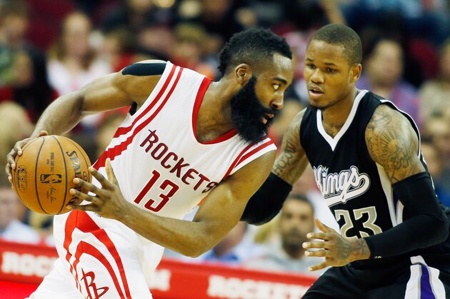 HOUSTON, TX - APRIL 01:   James Harden #13 of the Houston Rockets looks to drive with the basketball against Ben McLemore #23 of the Sacramento Kings during their game at the Toyota Center on April 1, 2015 in Houston, Texas. NOTE TO USER: User expressly acknowledges and agrees that, by downloading and/or using this photograph, user is consenting to the terms and conditions of the Getty Images License Agreement. (Photo by Scott Halleran/Getty Images)