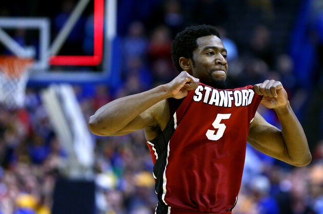 ST LOUIS, MO - MARCH 23:  Chasson Randle #5 of the Stanford Cardinal celebrates defeating the Kansas Jayhawks 60 to 57 during the third round of the 2014 NCAA Men's Basketball Tournament at Scottrade Center on March 23, 2014 in St Louis, Missouri.  (Photo by Dilip Vishwanat/Getty Images)