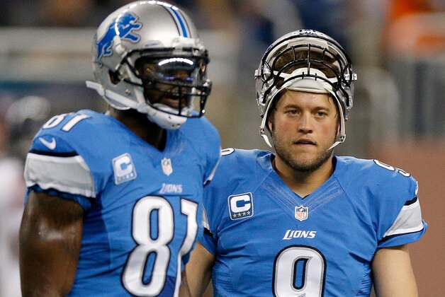 DETROIT, MI - SEPTEMBER 29: Calvin Johnson #81 and Matthew Stafford #9 of the Detroit Lions prepare to play the Chicago Bears during pregame at Ford Field on September 29, 2013 in Detroit, Michigan. (Photo by Gregory Shamus/Getty Images)