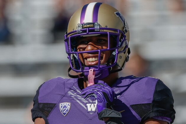 SEATTLE, WA - SEPTEMBER 06:  Marcus Peters #21 of the Washington Huskies looks on prior to the game against the Eastern Washington Eagles on September 6, 2014 at Husky Stadium in Seattle, Washington.  (Photo by Otto Greule Jr/Getty Images)