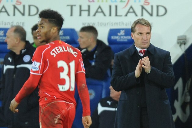 Liverpool's Raheem Sterling, left, is subtistuted by manager Brendan Rodgers, right, during the English Premier League soccer match between Leicester City and Liverpool at King Power Stadium, in Leicester, England, Tuesday, Dec. 2, 2014.  (AP Photo/Rui Vieira)
