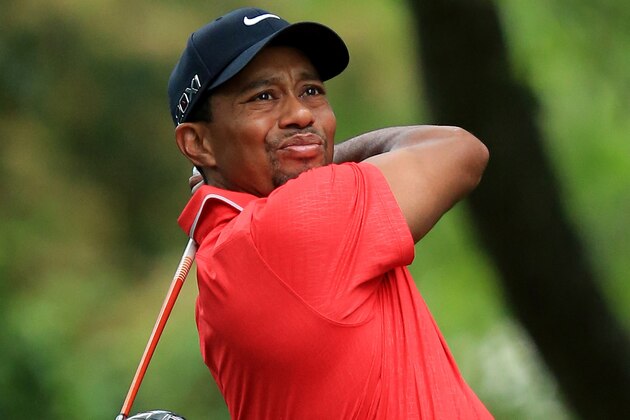AUGUSTA, GA - APRIL 14:  Tiger Woods of the United States tees off on the second hole during the final round of the 2013 Masters Tournament at Augusta National Golf Club on April 14, 2013 in Augusta, Georgia.  (Photo by David Cannon/Getty Images)