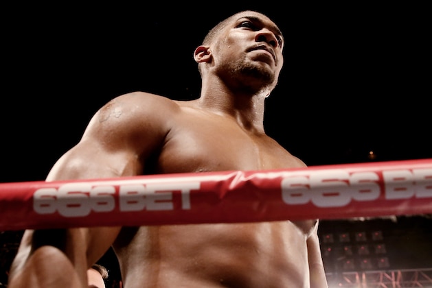 LIVERPOOL, ENGLAND - NOVEMBER 22:  Anthony Joshua before his Eliminator for the British Heavyweight Championship bout with Michael Sprott at Liverpool Echo Arena on November 22, 2014 in Liverpool, England.  (Photo by Scott Heavey/Getty Images)