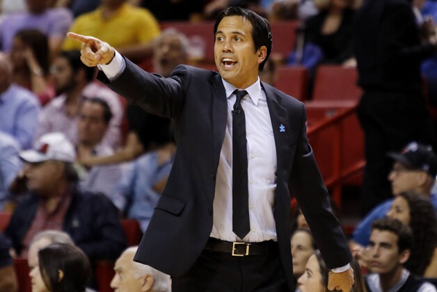 Miami Heat head coach Erik Spoelstra reacts in the second half of his team's 95-81 loss to the San Antonio Spurs in an NBA basketball game, Tuesday, March 31, 2015, in Miami. (AP Photo/Joe Skipper)