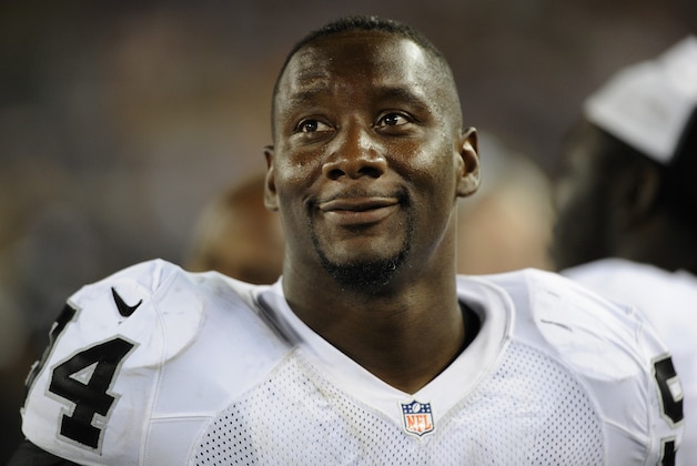 MINNEAPOLIS, MN - AUGUST 8: Antonio Smith #94 of the Oakland Raiders looks on during the fourth quarter of the game against the Minnesota Vikings on August 8, 2014 at TCF Bank Stadium in Minneapolis, Minnesota. The Vikings defeated the Raiders 10-6. (Photo by Hannah Foslien/Getty Images)