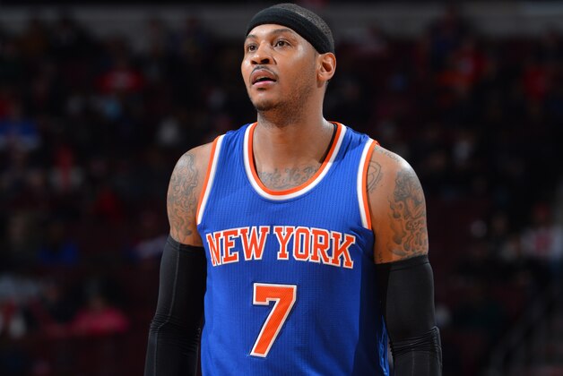 PHILADELPHIA, PA - JANUARY 21: Carmelo Anthony #7 of the New York Knicks looks on against the Philadelphia 76ers at Wells Fargo Center on January 21, 2015 in Philadelphia, Pennsylvania NOTE TO USER: User expressly acknowledges and agrees that, by downloading and/or using this Photograph, user is consenting to the terms and conditions of the Getty Images License Agreement. Mandatory Copyright Notice: Copyright 2015 NBAE (Photo by Jesse D. Garrabrant/NBAE via Getty Images)