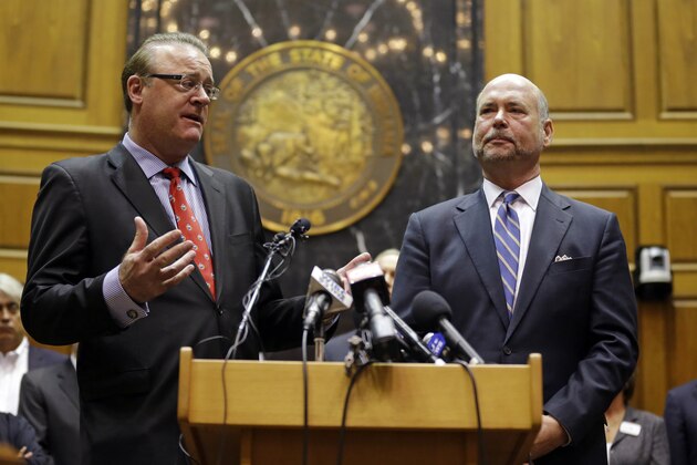 Indiana Senate President Pro Tem David Long, left, (R-Fort Wayne) and House Speaker Brian C. Bosma (R-Indianapolis) announce changes to the state's new religious objections law during a press conference in the House chamber at the Statehouse in Indianapolis, Thursday, April 2, 2015.  The measure has faced criticism it could allow discrimination against lesbians and gays. (AP Photo/Michael Conroy)