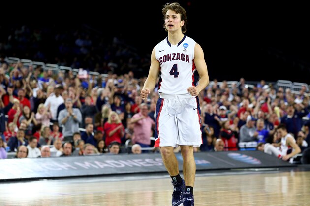HOUSTON, TX - MARCH 27: Kevin Pangos #4 of the Gonzaga Bulldogs reacts against the UCLA Bruins during a South Regional Semifinal game of the 2015 NCAA Men's Basketball Tournament at NRG Stadium on March 27, 2015 in Houston, Texas.  (Photo by Ronald Martinez/Getty Images)