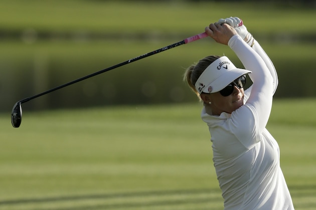 Morgan Pressel hits from the fairway on the 18th hole during the first round of the LPGA Tour ANA Inspiration golf tournament at Mission Hills Country Club on Thursday, April 2, 2015 in Rancho Mirage, Calif. (AP Photo/Chris Carlson)