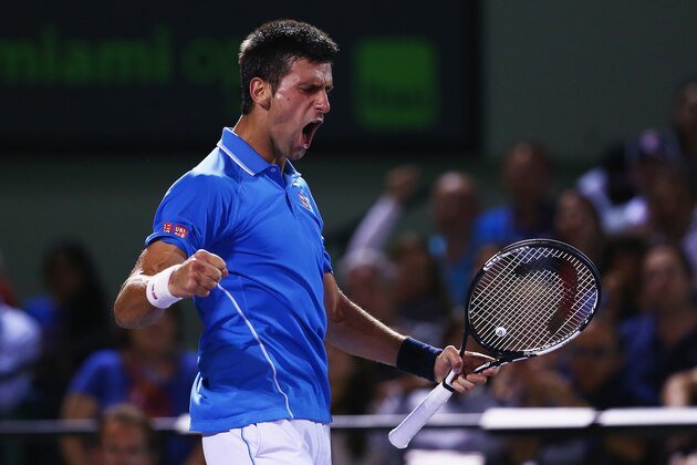 KEY BISCAYNE, FL - APRIL 02:  Novak Djokovic of Serbia celebrates break point against David Ferrer of Spain in their quarter final during the Miami Open Presented by Itau at Crandon Park Tennis Center on April 2, 2015 in Key Biscayne, Florida.  (Photo by Clive Brunskill/Getty Images)