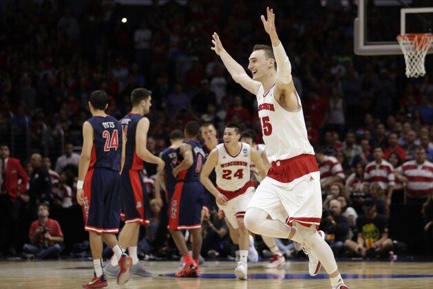 Wisconsin forward Sam Dekker celebrates at the end of a college basketball regional final against Arizona in the NCAA Tournament, Saturday, March 28, 2015, in Los Angeles. Wisconsin beat Arizona 85-78 to advance to the Final Four. (AP Photo/Jae C. Hong)
