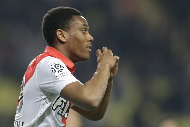 Monaco's Anthony Martial reacts after scoring the first goal against Bastia during their French League One soccer match, in Monaco stadium, Friday, March 13, 2015. (AP Photo/Lionel Cironneau)