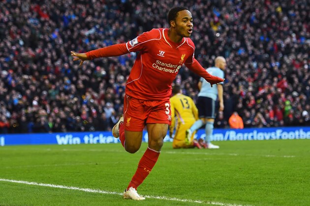 LIVERPOOL, ENGLAND - JANUARY 31:  Raheem Sterling of Liverpool celebrates scoring the opening goal during the Barclays Premier League match between Liverpool and West Ham United at Anfield on January 31, 2015 in Liverpool, England.  (Photo by Shaun Botterill/Getty Images)