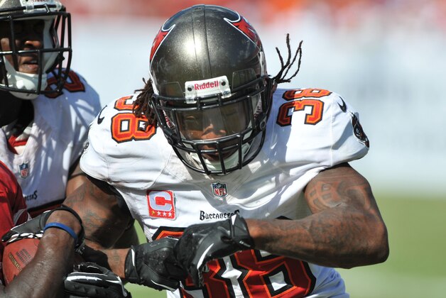 TAMPA, FL - SEPTEMBER 29: Safety Dashon Goldson #38 of the Tampa Bay Buccaneers sets for a tackle against the Arizona Cardinals September 29, 2013 at Raymond James Stadium in Tampa, Florida. Goldson was penalized on the play. Arizona won 13 - 10. (Photo by Al Messerschmidt/Getty Images)