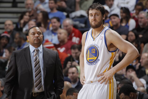 OAKLAND, CA - JANUARY 31: Head Coach Mark Jackson and Andrew Bogut #12 of the Golden State Warriors in a game against the Dallas Mavericks on January 31, 2013 at Oracle Arena in Oakland, California. NOTE TO USER: User expressly acknowledges and agrees that, by downloading and or using this photograph, user is consenting to the terms and conditions of Getty Images License Agreement. Mandatory Copyright Notice: Copyright 2013 NBAE (Photo by Rocky Widner/NBAE via Getty Images)